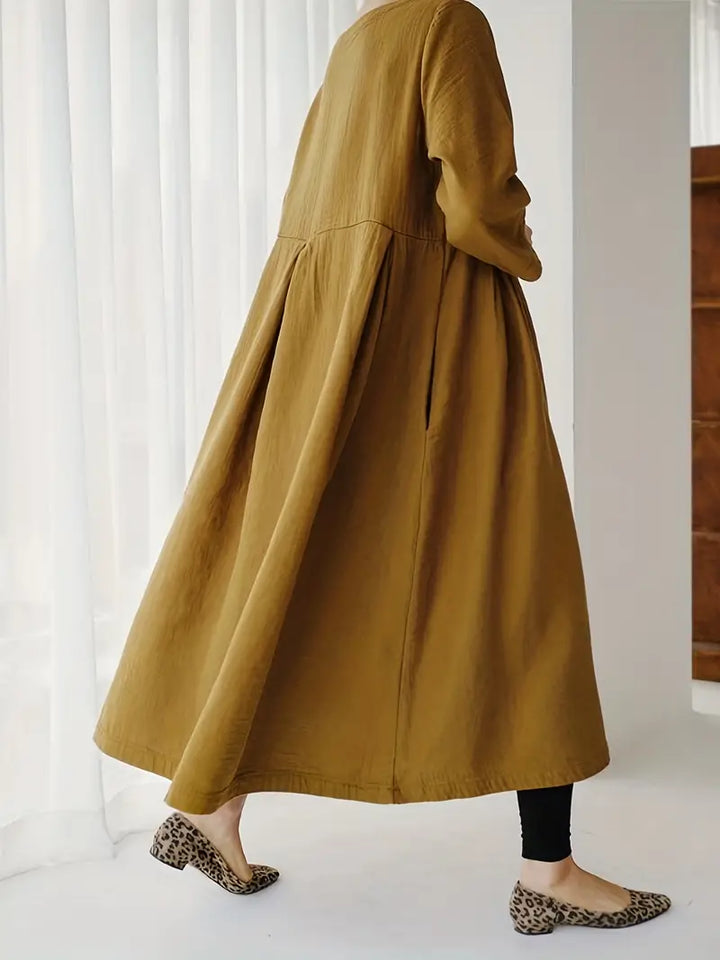 Meike - Elegantejurk met geplooide zakken